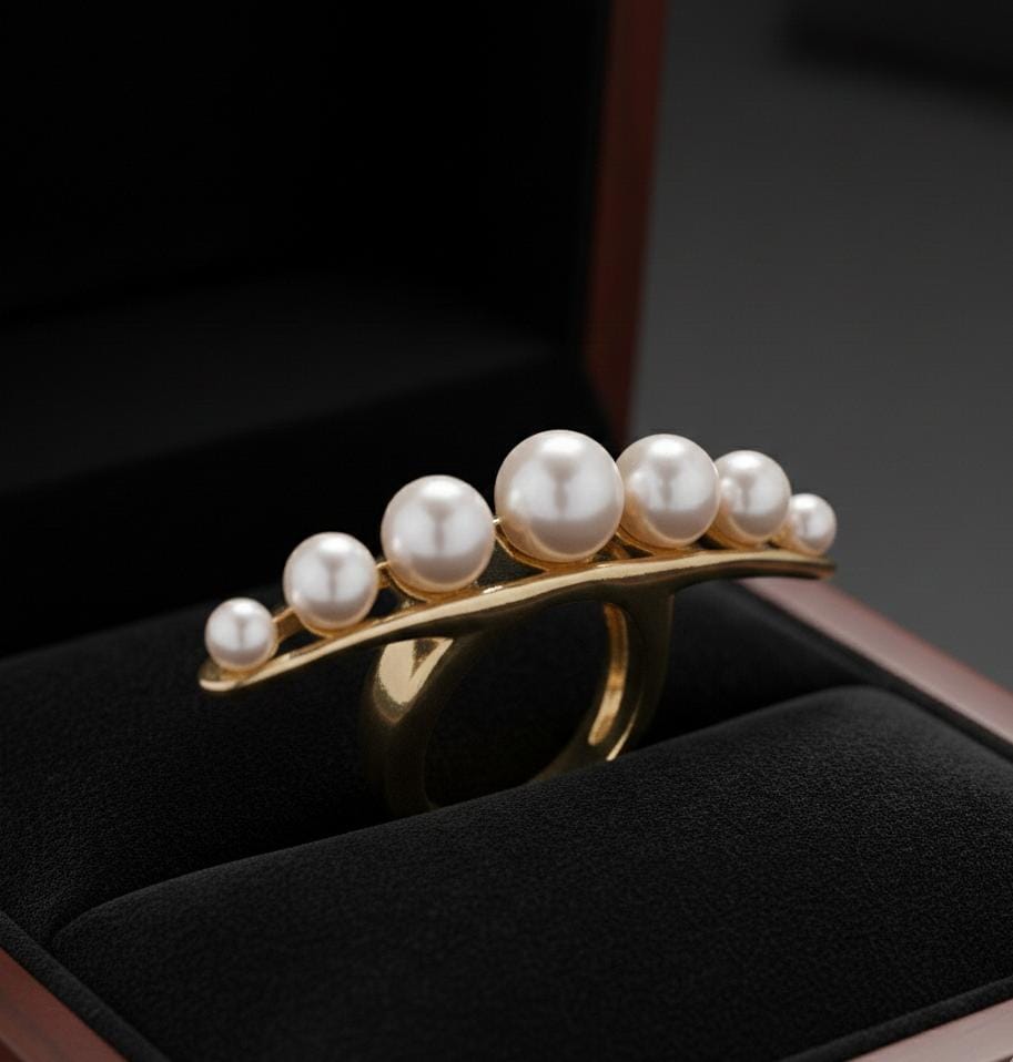 925 sterling silver string of pearl ring with a minimalistic band design, elegant and dainty jewelry for women.