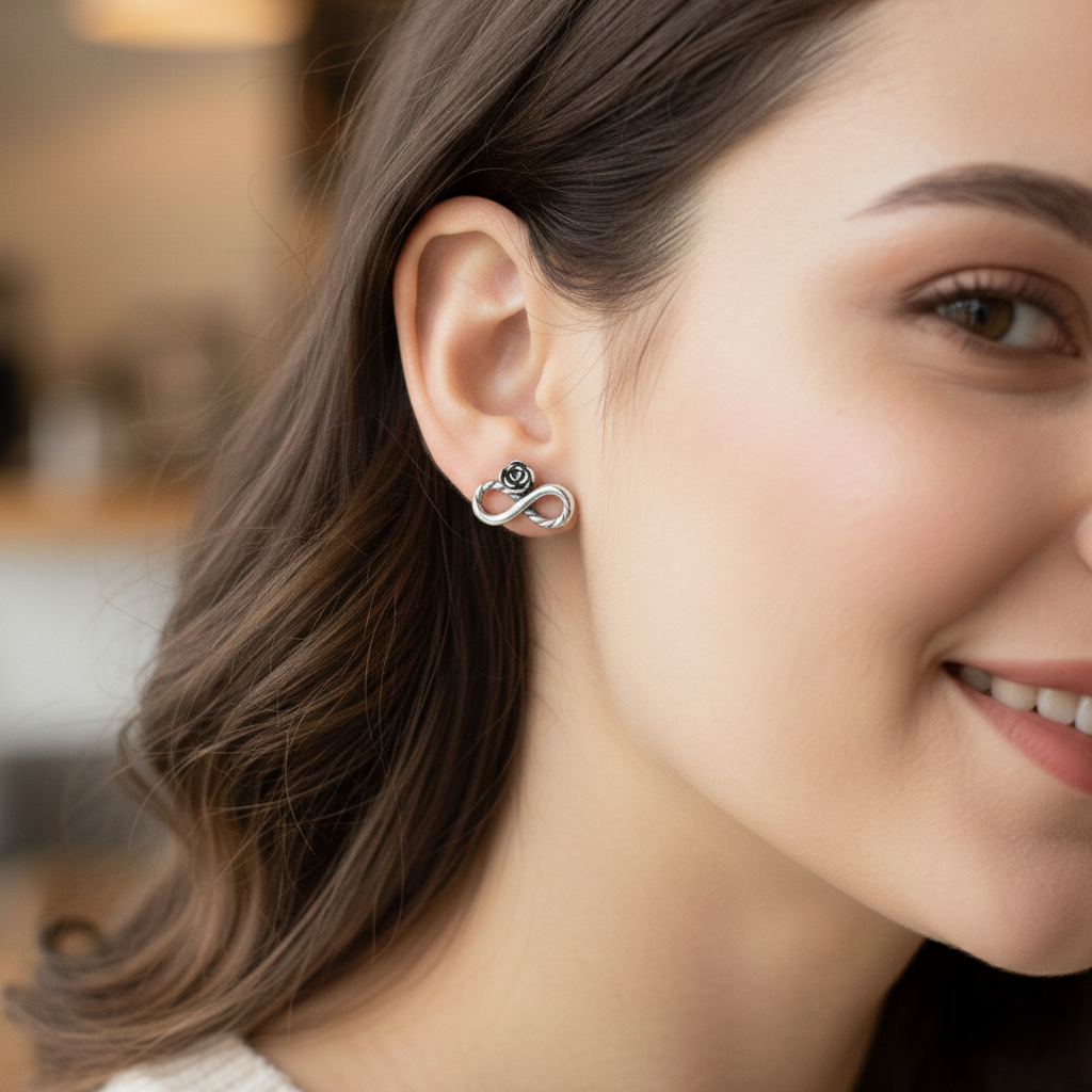 Rose sterling silver infinity stud earrings for women featuring a twisted minimalist 925 silver design.