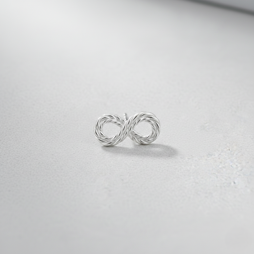 Sterling silver infinity stud earrings with a twisted 925 silver design, elegant minimalist jewelry for her.