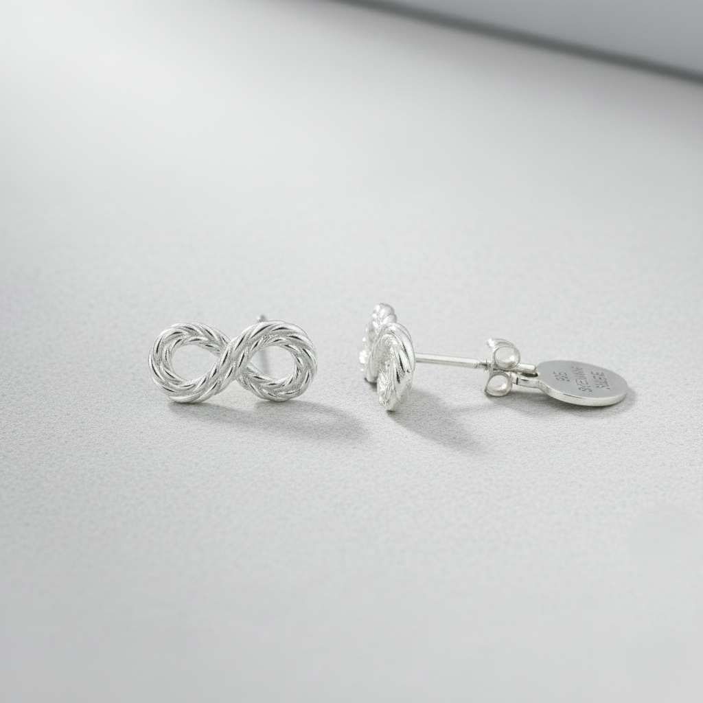 Sterling silver infinity stud earrings with a twisted 925 silver design, elegant minimalist jewelry for her.